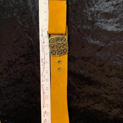 Vintage belts, perfume and other things in the bathroom cabinet