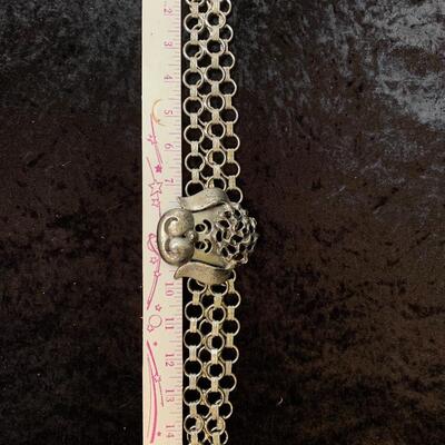 Vintage belts, perfume and other things in the bathroom cabinet