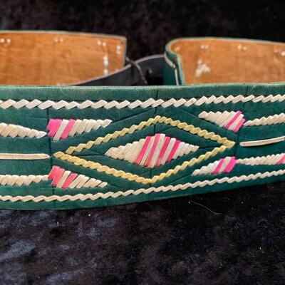Vintage belts, perfume and other things in the bathroom cabinet