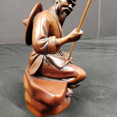 Elegant Wood Carved Fisherman