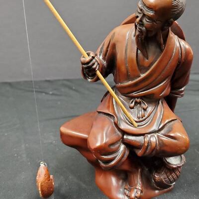 Elegant Wood Carved Fisherman