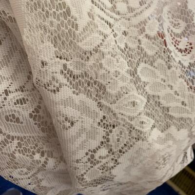 Wall of lace curtains