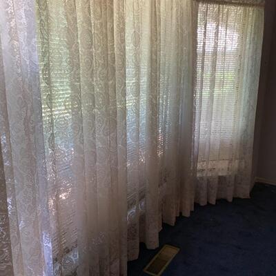 Wall of lace curtains