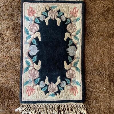 2 Complimentary Exquisite Rugs