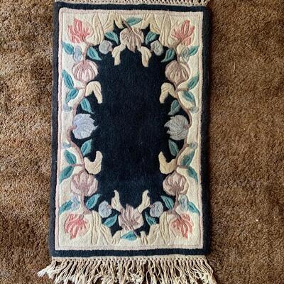 2 Complimentary Exquisite Rugs