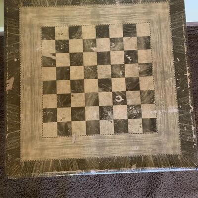 Well used vintage checker board card table