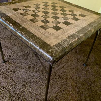 Well used vintage checker board card table