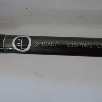 LOT 928. SHIMANO FISHING POLE AND SIENNA 2500FB REEL