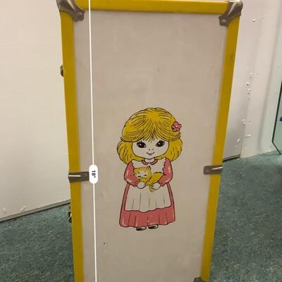 Vintage doll clothes in trunk