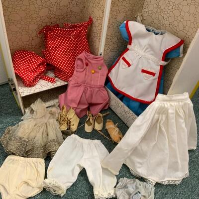 Vintage doll clothes in trunk