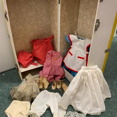 Vintage doll clothes in trunk