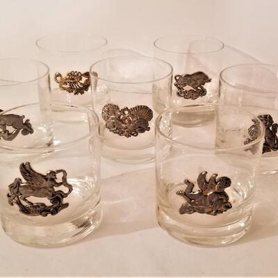 Lot #28  7 Mid Century Hi-ball glasses - signs of the Zodiac