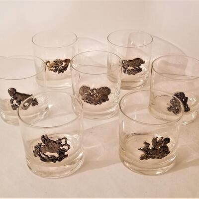 Lot #28  7 Mid Century Hi-ball glasses - signs of the Zodiac