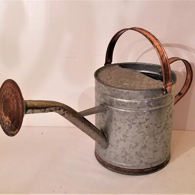 Lot #41  Two Vintage Watering Cans with Brass Nozzles