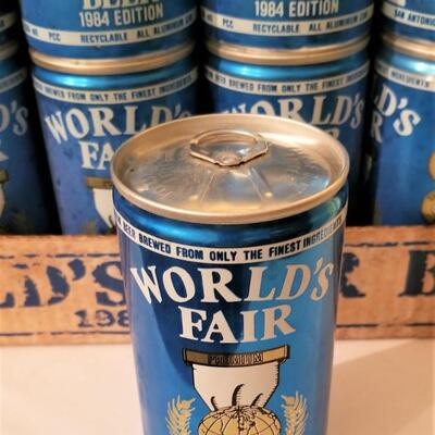 Lot #45  Lot of 1984 World's Fair Beer Cans in Original Flat - one still intact