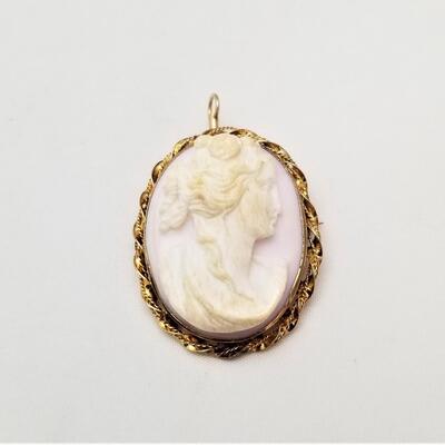 Lot #54  Carved Cameo set in 10KT Gold Mount.