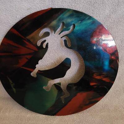 Kokopelli cut in metal