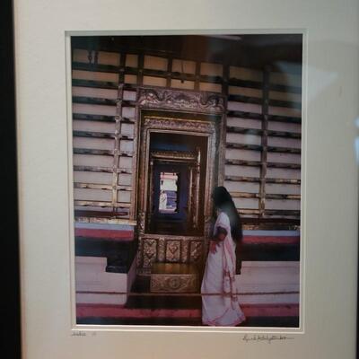 INDIA PHOTO WOMAN OBSERVING TEMPLE DOORWAY