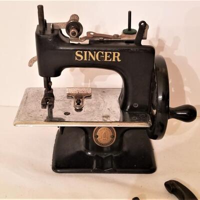 Lot #64  Antique Miniature/Toy Singer Sewing Machine