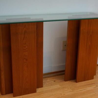 ABSTRACT HALL TABLE WITH TIERED SUPPORTS AND BEVEL GLASS TOP