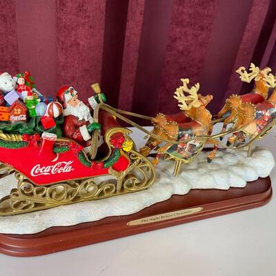 Lot 66  Coca-Cola Santa Sleigh and Reindeer Figurine
