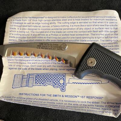 Lot 77 Knives: Buck Pocket Knife, Smith & Wesson 1st Response Knife, and 2 Pocket Knives