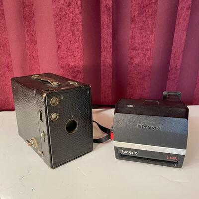 Lot 83  Antique Brownie Box Camera and Polaroid Sun 600 LMS