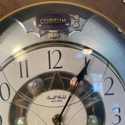 Lot 106  Cuorum Small World Rhythm Clock - Plays 12 Melodies & 3 Christmas Songs