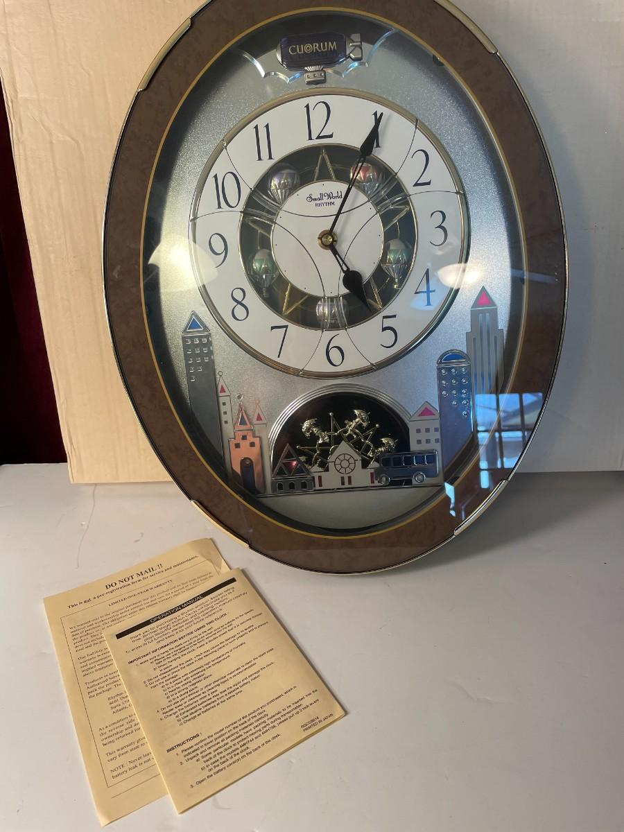 Lot 106 Cuorum Small World Rhythm Clock Plays 12 Melodies & 3