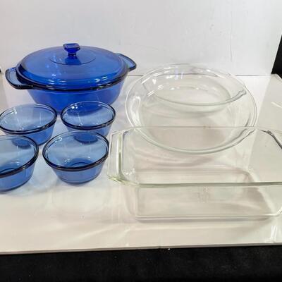 Lot 124  Glass Bakeware. Blue Casserole Dish & 4 Small Bowls.  2 Clear Pyrex Pie Plates, and Square Bake Dish.