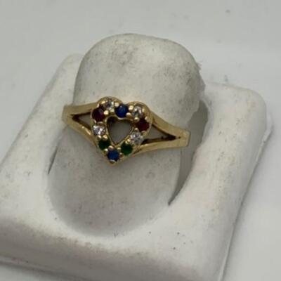 14 k ring diamonds and other precious stones 5.9 grams  size 7