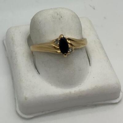 14 k ring   Blk onx and diamond 5. 1 g   size 7