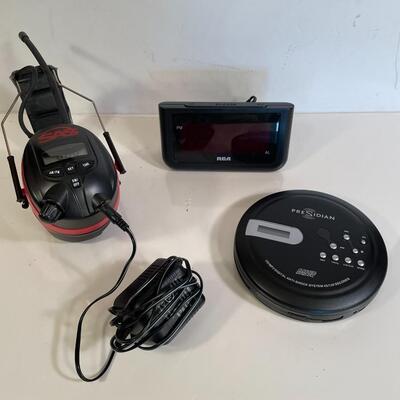 Lot 160  SAS Headphones w/ Charger, RCA Alarm Clark, and Presidian MP3 Digital (No charger)