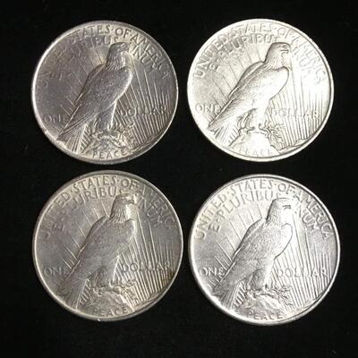 4 Brilliant uncirculated  Peace dollars 1922,23,24,25. Reserve set