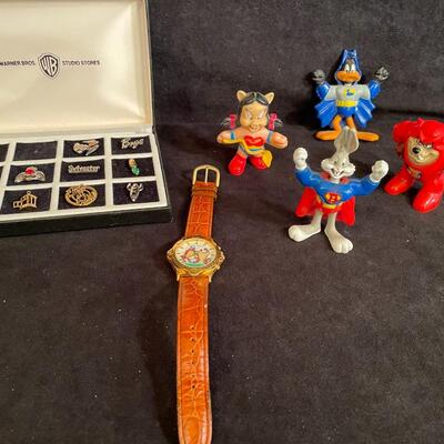 Lot 171  Looney Tunes Collectable Pins, Tasmanian Devil Watch, and Figurines