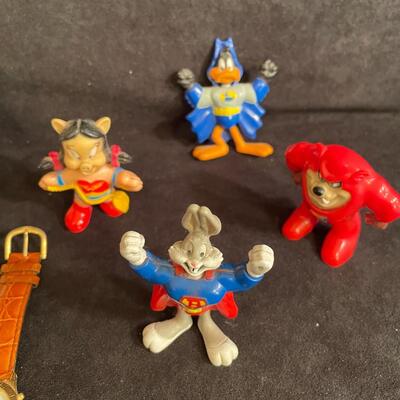 Lot 171  Looney Tunes Collectable Pins, Tasmanian Devil Watch, and Figurines