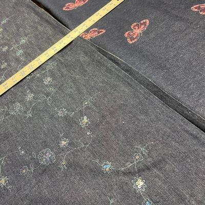 Denim material with sequin design flowers and butterflies