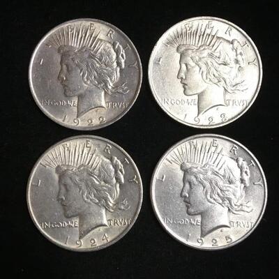 4 Uncirculated  Peace Dollars .Reserve