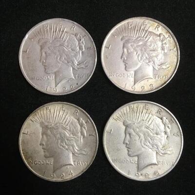 4 Peace dollars 1922 through 1925. Reserve