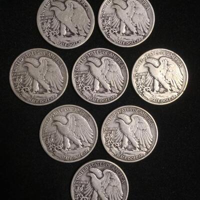 8 Walking liberty half dollars. Reserve