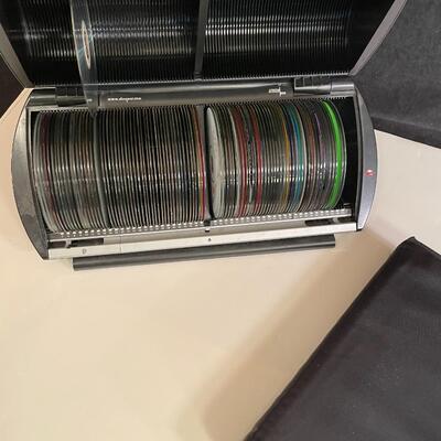 Lot 175  Discgear 100 CD Case and Case Logics Cloth CD Case (CDs Included)