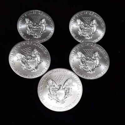 5 American silver eagles.  2012 Reserve set