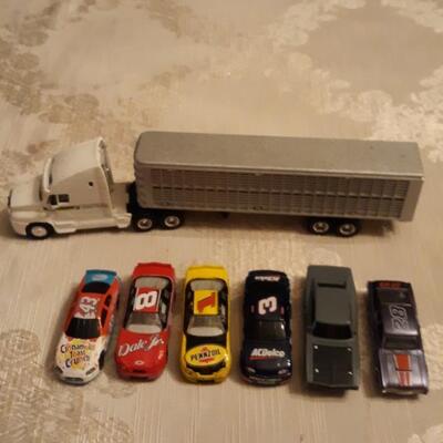 John Deere truck and lot of cars