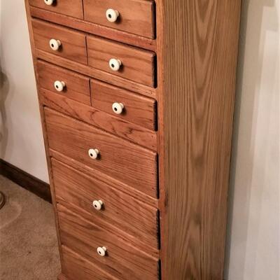 Lot #105  Solid Oak Chest - 7 Drawers