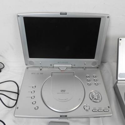 2 Polaroid DVD Players with Normal and Car Chargers, remotes and headphones