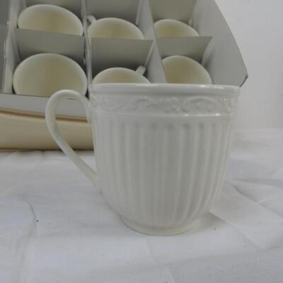 8 White Mikasa Stoneware Cups with White Case