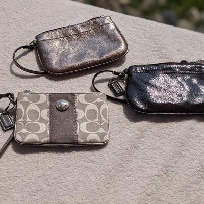 Two Coach Wristlets and more