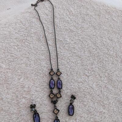 Two beautiful necklace and earring sets and an awesome Peacock Necklace
