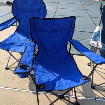 Five folding outdoor chairs with bags