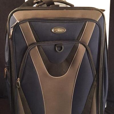 Lot  203  Skyway Large Suitcase w/ Lock & Keys. Soft Sided on Rollers.